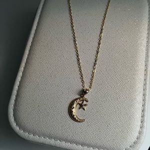 14kt gold pendant with 14kt gold 16” chain.
